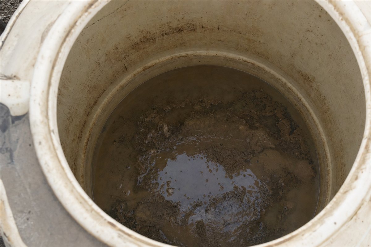 Sludge and sediment collected at the bottom of a Delhi home water tank before cleaning
