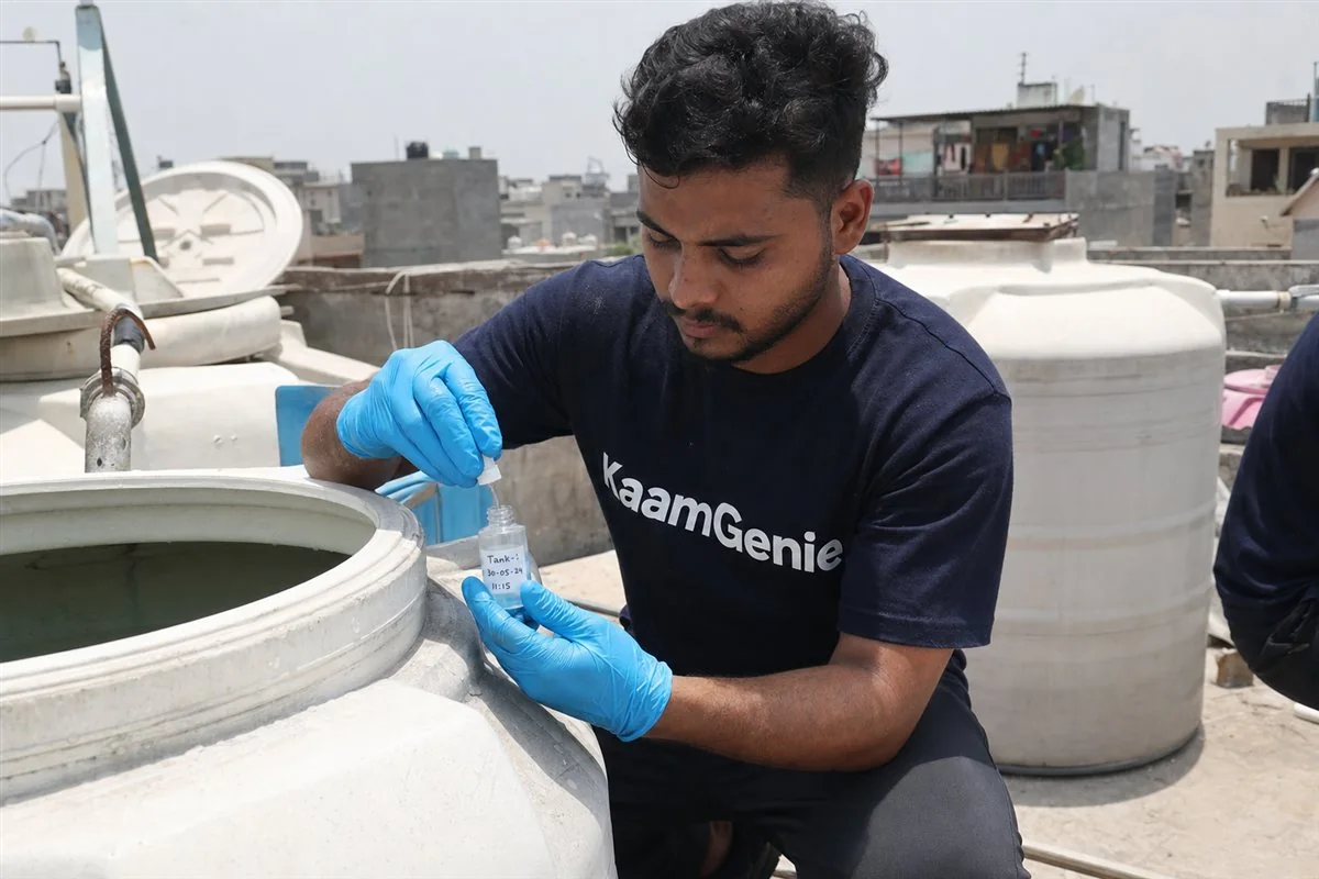 A restaurant kitchen water storage tank in Delhi alongside a completed cleaning certificate kept for FSSAI inspection