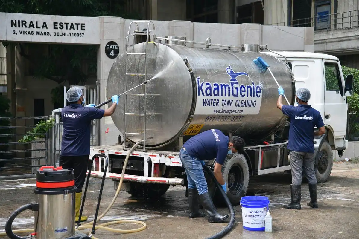 KaamGenie water tanker cleaning crew arriving at a Delhi home, same-day near-you service