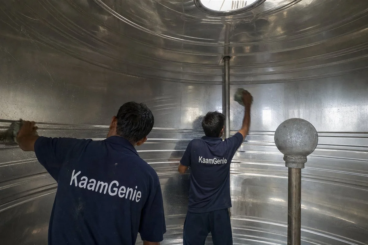 A clean, sparkling water tank interior in Noida after full scrubbing and food-grade chlorine disinfection